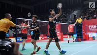 Ganda campuran Indonesia, Tontowi Ahmad/Liliyana Natsir usai melawan Lee Yang/Hsu Ya Ching (Taiwan) pada babak kedua Indonesia Masters 2018 di Istora Senayan, Jakarta, Kamis (25/1). Tontowi/Liliyana unggul 21-12, 21-10. (Liputan6.com/Helmi Fithriansyah)