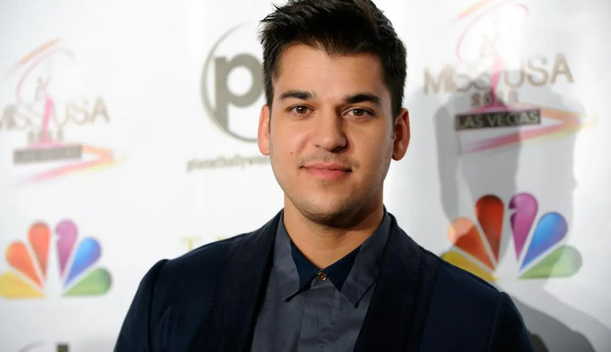Rob Kardashian pun membalasnya dengan "aku juga" dengan menambahkan emoji hati berwarna biru. (UPI)