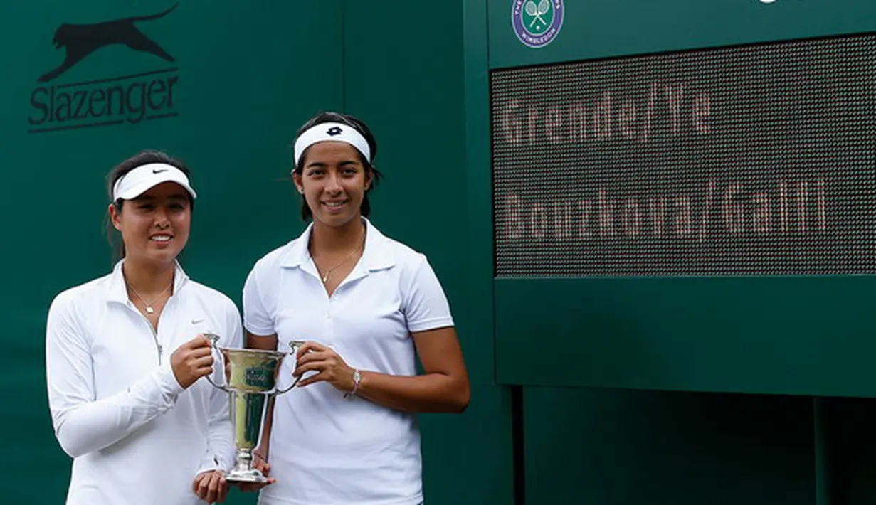 Berpasangan dengan petenis Tiongkok, Qiu Yu Ye, Tami mengalahkan Marie Bouzkova/Dalma Galfi, 6-2, 7-6(5), Minggu (6/7/2014) (Wimbledon.com)