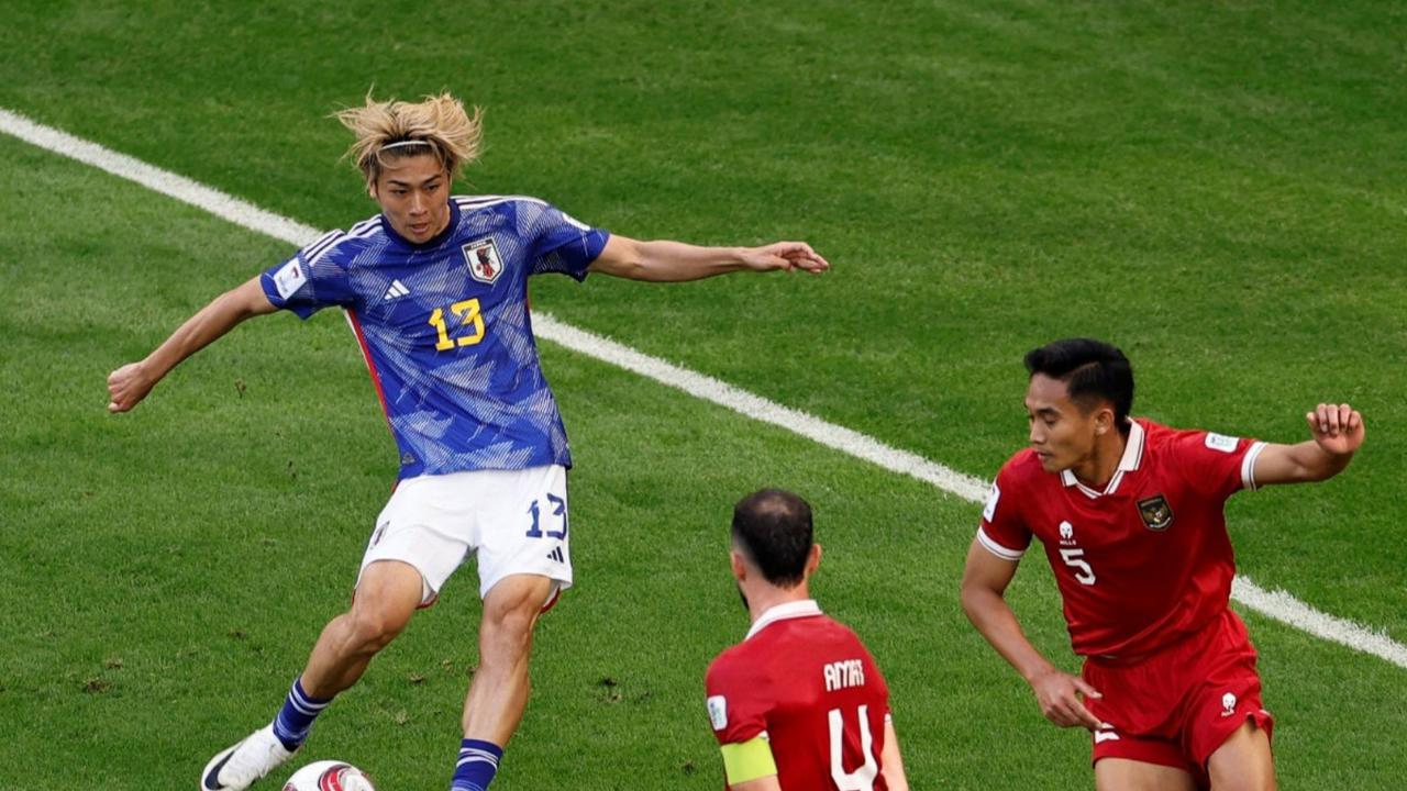 Kemenangan ini memastikan Timnas Jepang melaju ke babak 16 besar sebagai runner-up grup D, sementara Timnas Indonesia finis sebagai peringkat tiga.<br>(Foto&nbsp;REUTERS/Thaier Al-Sudani)