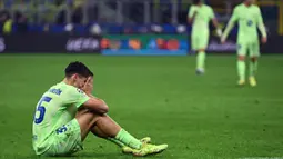 Bermain di Stadion San Siro, Barcelona harus mengakui tim tuan rumah Inter Milan dengan skor 3-4. (PIERO CRUCIATTI/AFP)