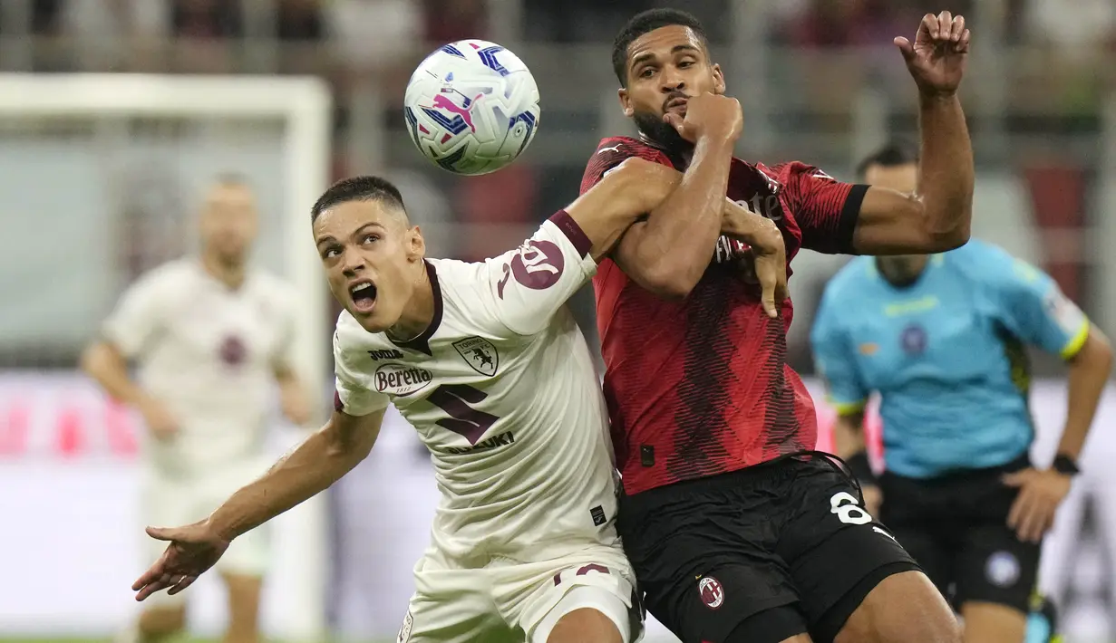 Berkat hasil ini, AC Milan menempati puncak klasemen sementara Liga Italia. (AP Photo/Luca Bruno)