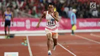 Atlet para atletik Indonesia, Rasyidi bersiap melakukan lompatan pada lomba lompat jauh T44, T62/T64 putra Asian Para Games 2018 di Stadion Utama Gelora Bung Karno, Jakarta, Jumat (12/10). Rasyidi meraih perunggu. (Liputan6.com/Helmi Fithriansyah)