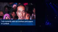 Presiden RI, Joko Widodo, memeberi Sambutan dari layar raksasa saat penutupan Asian Games di SUGBK, Jakarta, Minggu (2/9/2018). (Bola.com/Vitalis Yogi Trisna)