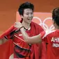 Tontowi Ahmad dan Liliyana Natsir merayakan kemenangan usai meraih medali emas Olimpiade Rio 2016 setelah mengalahkan Peng Soon Chan dan Liu Ying Goh dari Malaysia.(AP/Mark Humphrey)