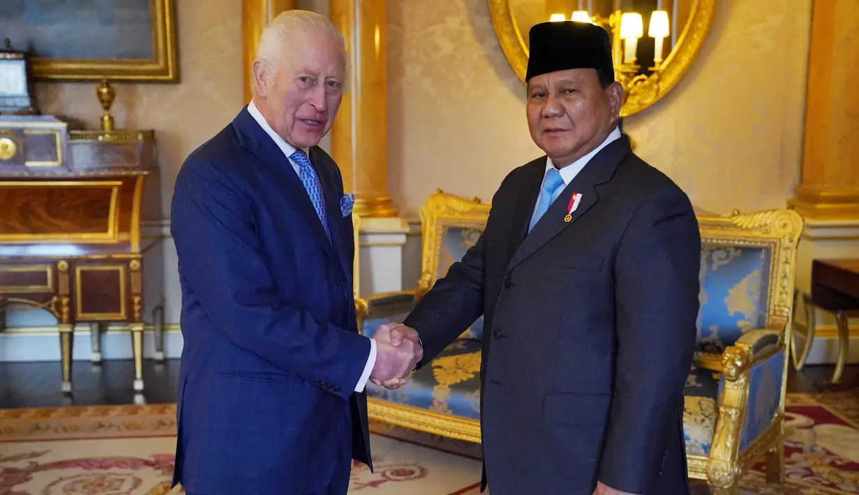 Di Inggris, Presiden Prabowo Subianto dijadwalkan mengadakan sejumlah pertemuan, termasuk bertemu Raja Charles III. (Jonathan Brady/POOL/AFP)