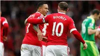 SELEBRASI - Rooney melakukan selebrasi usai menjebol jala Sunderland. (AP)