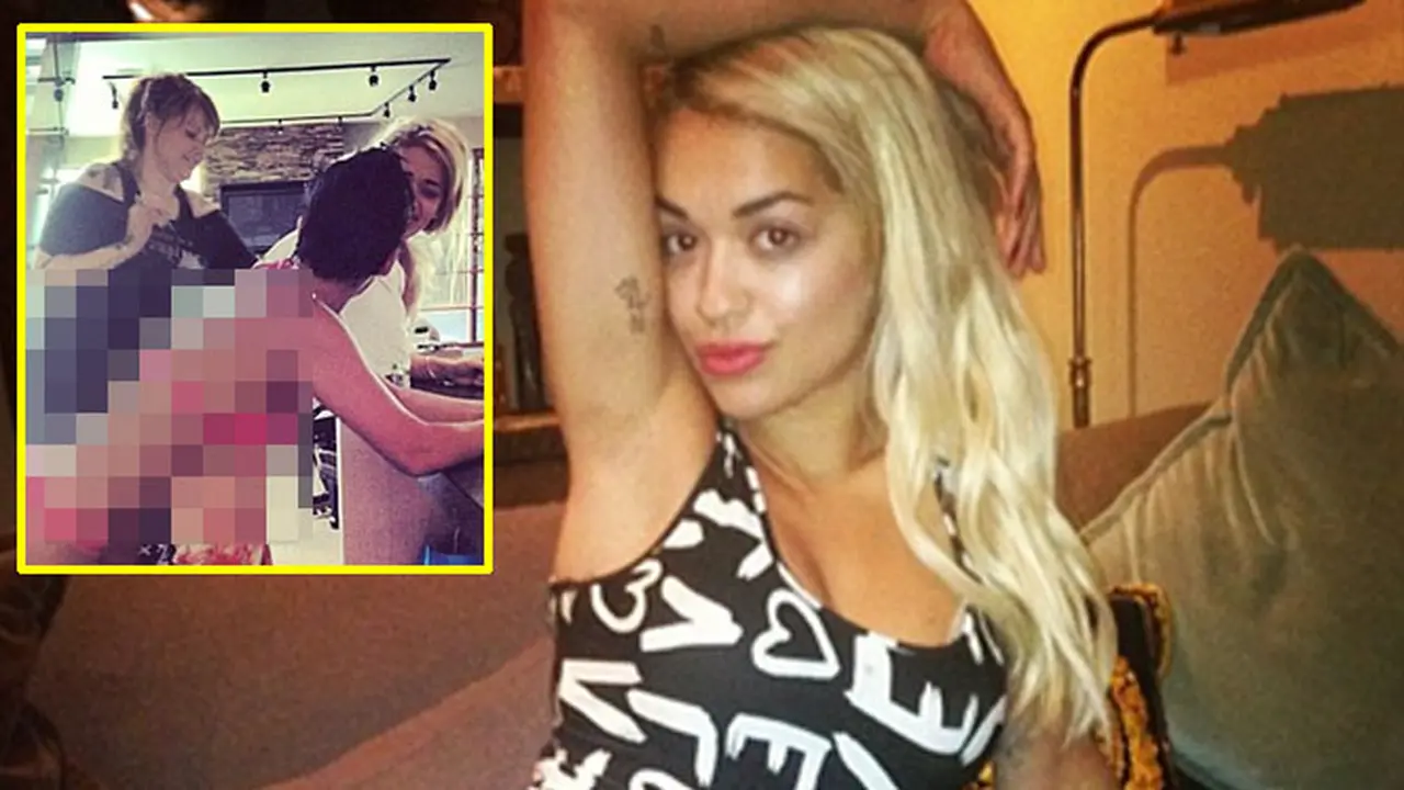rita-ora-tato-130927b.jpg