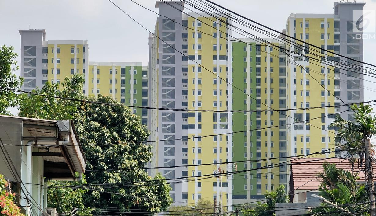 Pemandangan proyek Rusunawa Pasar Rumput yang hampir selesai pengerjaannya di Jakarta, Selasa (16/7/2019). Rusunawa Pasar Rumput akan diresmikan oleh Presiden Joko Widodo atau Jokowi pada Agustus mendatang. (Liputan6.com/Immanuel Antonius)