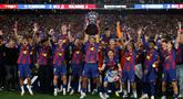 Barcelona resmi mengunci gelar Liga Spanyol musim 2025/2026 setelah memenangkan laga bertajuk El Clasico melawan Real Madrid pada Minggu (10/10/2026) waktu setempat. (AP Photo/Joan Monfort)
