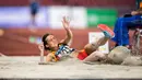 Atlet Kyrgyzsta Anna Bulanova saat tampil pada babak final Lompat Jauh Putri Asian Games 2018 di Stadion Utama Gelora Bung Karno, Senayan, Jakarta, Senin (27/8). Sebanyak 11 atlet turun di final nomor lompat jauh putri (ANTARA FOTO/INASGOC/M Agung Rajasa)