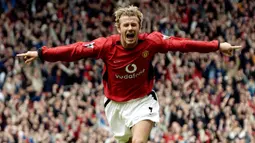 David Beckham. Telah memperkuat Manchester United dalam 389 pertandingan mulai musim 1992/1993 hingga 2002/2003. Berhasil membuat 85 gol dan 98 assist. Meraih 6 trofi Liga Inggris, 2 Piala FA, 2 Charity Shield, 1 Liga Champions dan 1 Piala Toyota. (AFP/Paul Barker)