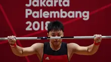 Rahmat Erwin Abdullah tampil di kelas 77 kg pada Asian Games 2018 lalu (ANTARA FOTO/INASGOC/Helmi Afandi/YU/18.)