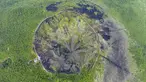 Pemandangan objek wisata Wudalianchi di Heihe, Heilongjiang, China, Jumat (3/7/2020). Wudalianchi atau lima danau bendungan lava memiliki geomorfologi dan geologi gunung berapi tipikal yang masih utuh serta dianggap sebagai Museum Gunung Berapi Alami oleh kalangan geolog. (Xinhua/Xie Jianfei)