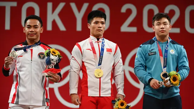 Foto: Eko Yuli Irawan Persembahkan Medali Kedua bagi Indonesia Setelah Sabet Perak di Cabang Olahraga Angkat Besi Olimpiade Tokyo 2020
