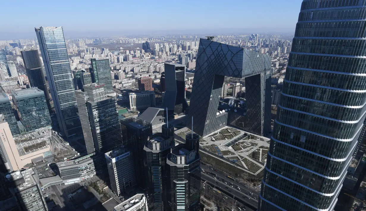 Pemandangan gedung-gedung di Kota Beijing, Tiongkok (23/12). Sebelumnya, selama hampir seminggu Kota Beijing dilanda kabut polusi yang mengganggu aktivitas warga setempat. (AFP/Greg Baker)