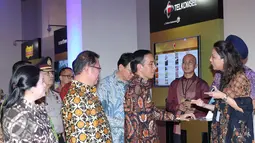 Presiden Joko Widodo usai meresmikan internet cepat 4G-LTE secara nasional di Jakarta, Jumat (11/10). Dengan tema Revolusi Digital Layanan 4G-LTE dapat dinikmati secara nasional di semua provaider yang berada di Indonesia. (Liputan6.com/Angga Yuniar)