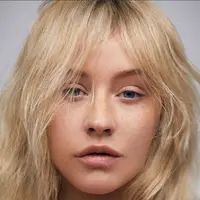 Jauh dari kesan glamor, penyanyi ini tampil alami tanpa makeup. (Sumber foto: USA Today)