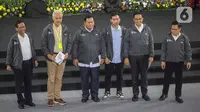 Ketiga Calon Presiden dan Calon Wakil Presiden pada Pemilu 2024 berfoto bersama sesaat sebelum mengakhiri kegiatan Paku Integritas di Gedung Merah Putih Komisi Pemberantasan Korupsi (KPK), Jakarta, Rabu (17/1/2024). (Liputan6.com/Angga Yuniar)