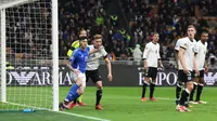 Duel&nbsp;Timnas Italia vs Timnas Jerman pada laga leg pertama perempat final UEFA Nations League di San Siro, Jumat dini hari WIB (21-3-2025). (Bola.com/figc.it)