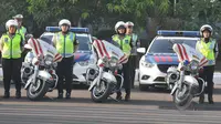 Sejumlah anggota kepolisian saat mengikuti Apel  "operasi patuh jaya 2015" di lapangan dit lantas Polda metro jaya, Jakarta, Rabu (27/5/2015). Operasi ini merupakan cipta kondisi menjelang bulan ramadan. (Liputan6.com/Herman Zakharia)