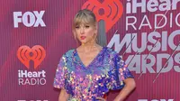 Taylor Swift di karpet merah iHeart Radio Music Awards 2019 di Teater Microsoft di Los Angeles, Amerika Serikat, 14 Maret 2019. (CHRIS DELMAS / AFP)