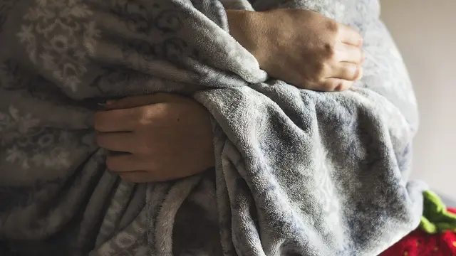 Ilustrasi selimut untuk pertolongan pertama.