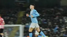 Aksi Phil Foden dalam laga Carabao Cup antara Manchester City vs Brentford, Kamis (18/12/2025). (AP Photo/Jon Super)