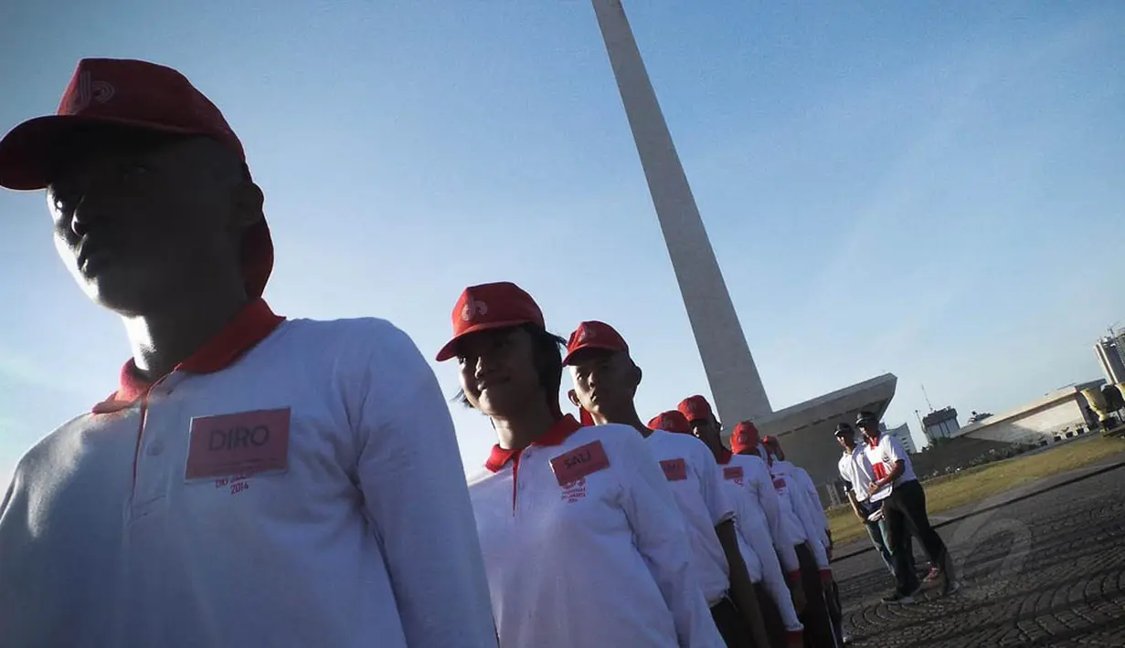 Mengenakan kaos berwarna putih dan topi berwarna merah para paskibraka ini terlihat kompak, Jakarta, Kamis (7/8/2014) (Liputan6.com/Faizal Fanani)