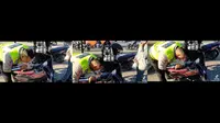 Seorang Polisi Sedot Bensin Motornya Untuk Bantu Pemotor yang Mogok