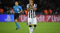 Striker Juventus Carlos Tevez ingin kembali ke klub lamanya, Boca Juniors (OLIVIER MORIN / AFP)