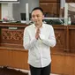 Ricky Rizal bersiap mengikuti sidang lanjutan kasus pembunuhan berencana Brigadir Yosua di PN Jakarta Selatan, Jakarta, Selasa (24/1/2023). Ricky Rizal Wibowo yang menjadi salah satu terdakwa dalam kasus pembunuhan berencana Nofriansyah Yosua Hutabarat (Brigadir J) mengaku menyesal tidak menyampaikan kejadian yang sebenarnya sejak awal penyidikan. (Liputan6.com/Faizal Fanani)