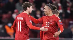 Denmark - Yussuf Poulsen dkk menjadi negara kedua yang mampu memastikan satu tiket ke Piala Dunia 2022. Tim Dinamit berhasil menyelesaikan delapan pertandingan di babak kualifikasi Piala Dunia dengan menyapu bersih kemenangan. (AFP/Liselotte Sabroe)