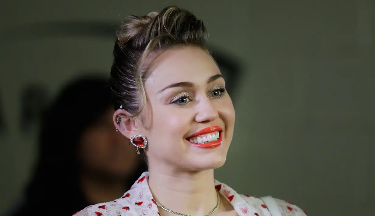 Miley Cyrus melakukan istirahat dari sosial media. Ia pun menghapus seluruh foto yang pernah diunggahnya. (Isaac Brekken  GETTY IMAGES NORTH AMERICA  AFP)