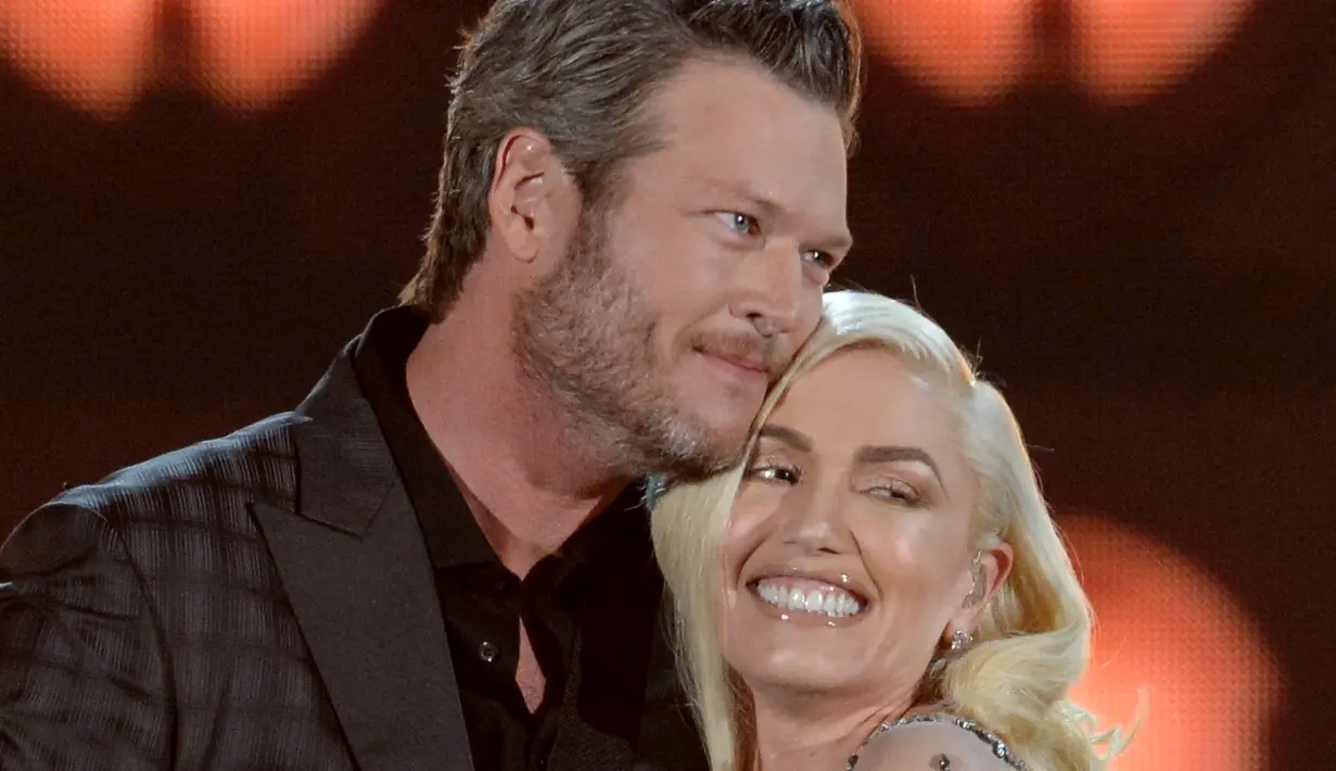 Hal tersebut membuat Gwen Stefani ingin memberikan Blake Shelton seorang anak biologis. (KEVIN WINTER / GETTY IMAGES NORTH AMERICA / AFP)