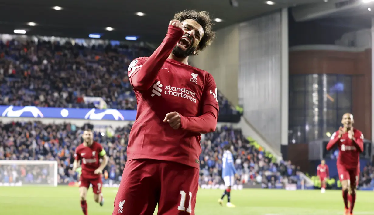 Liverpool berpesta gol saat membungkam Rangers dengan skor telak 7-1 dalam partai matchday 4 fase grup Liga Champions di Ibrox Stadium, Kamis (13/10/2022). (Steve Welsh/PA via AP)