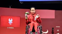 Lifter Ni Nengah Widiasih meraih medali perak pada Paralimpiade Tokyo 2020 setelah turun di kelas 41 kg putri.