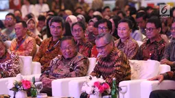 Menko Perekonomian Darmin Nasution dan Ketua OJK Wimboh Santoso menghadiri pembukaan Capital Market Summit & Expo 2019 di Balai Sidang Jakarta Convention Center (JCC), Jakarta, Jumat (23/8/2019). (Liputan6.com/Angga Yuniar)