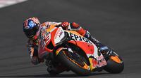 Pembalap Repsol Honda, Marc Marquez, enggan bicara kans menjuarai MotoGP Amerika Serikat setelah akan mengawali balapan di posisi kesembilan. (AFP/Mirco Lazzari)
