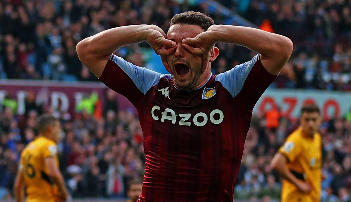 John McGinn menjadi salah satu gelandang paling menarik di Liga Inggris saat ini. Ia merupakan motor tengah dengan kemampuan passing dan teknis yang brilian. Pemain Aston Villa itu diketahui juga telah lama dikaitkan dengan mantan klub pelatihnya saat ini, Steven Gerrard. (AFP/Adrian Dennis)
