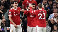 Manchester United meraih kemenangan 3-1 atas Burnley pada laga pekan ke-20 Premier League di Old Trafford, Jumat (31/12/2021) dini hari WIB. Satu dari tiga gol MU disarangkan Cristiano Ronaldo. (AFP/Oli Scarff)