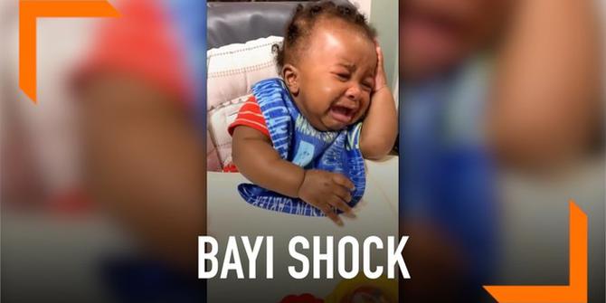 VIDEO: Shock Lihat Ayahnya Potong Rambut, Bayi Ini Nangis Histeris