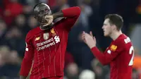 Penyerang Liverpool, Sadio Mane, melakukan selebrasi usai membobol gawang Wolverhampton Wanderers pada laga Premier League 2019 di Stadion Anfield, Minggu (29/12). Liverpool menang 1-0 atas Wolverhampton. (AP/Jon Super)