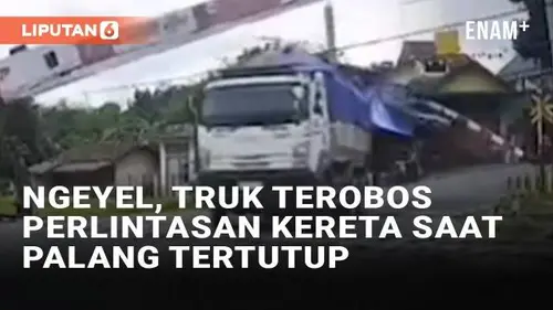 VIDEO: Ngeyel, Truk Paksa Terobos Perlintasan Kereta Saat Palang Tertutup