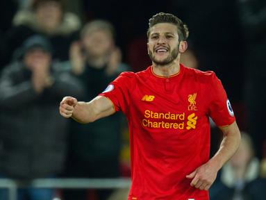 Adam Lallana menempati peringkat kelima top scorer sementara Liverpool, Lallana telah mencetak tujuh gol bagi The Reds di semua level kompetisi yang diikuti timnya. (EPA/Peter Powell)