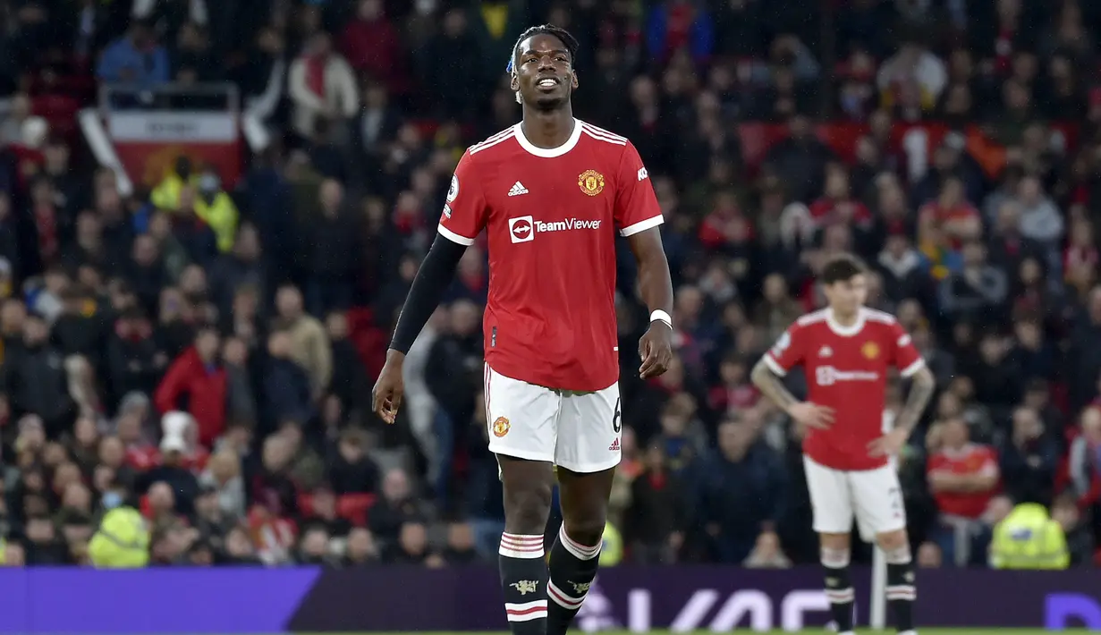 Paul Pogba. Mendapatkan poin 3. Dimasukkan di awal babak kedua untuk memperkuat lini tengah Manchester United. Nyatanya ia malah diusir wasit 14 menit kemudian usai pelanggaran keras terhadap Naby Keita. Ia juga menjadi penyebab awal lahirnya gol ke-5 Liverpool. (AP/Rui Vieira)