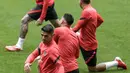 Penyerang Atletico Madrid, Luis Suarez melakukan pemanasan selama sesi latihan di stadion Wanda Metropolitano di Madrid, Selasa (14/9/2021). Atletico Madrid akan menjamu FC Porto di laga pembuka fase Grup B Liga Champions 2021-2022 pada Kamis dini hari, 16 September. (AP Photo/Manu Fernandez)
