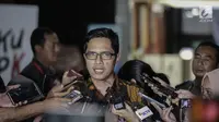 Juru bicara KPK, Febri Diansyah memberikan keterangan kepada awak media di Gedung KPK, Kamis (17/11). Febri mengatakan, ada konsekuensi hukum bagi pihak-pihak yang mencoba melakukan upaya merintangi proses penyidikan. (Liputan6.com/Faizal Fanani)