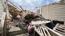 Setidaknya satu orang tewas dan hampir dua lusin terluka dalam badai yang melanda Mississippi pada Minggu malam. (AP Photo/Rogelio V. Solis)