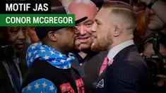 Berita video petarung Mixed Martial Arts (MMA), Conor McGregor, memakai jas bermotif kata-kata kasar saat menghadapi Floyd Mayweather.